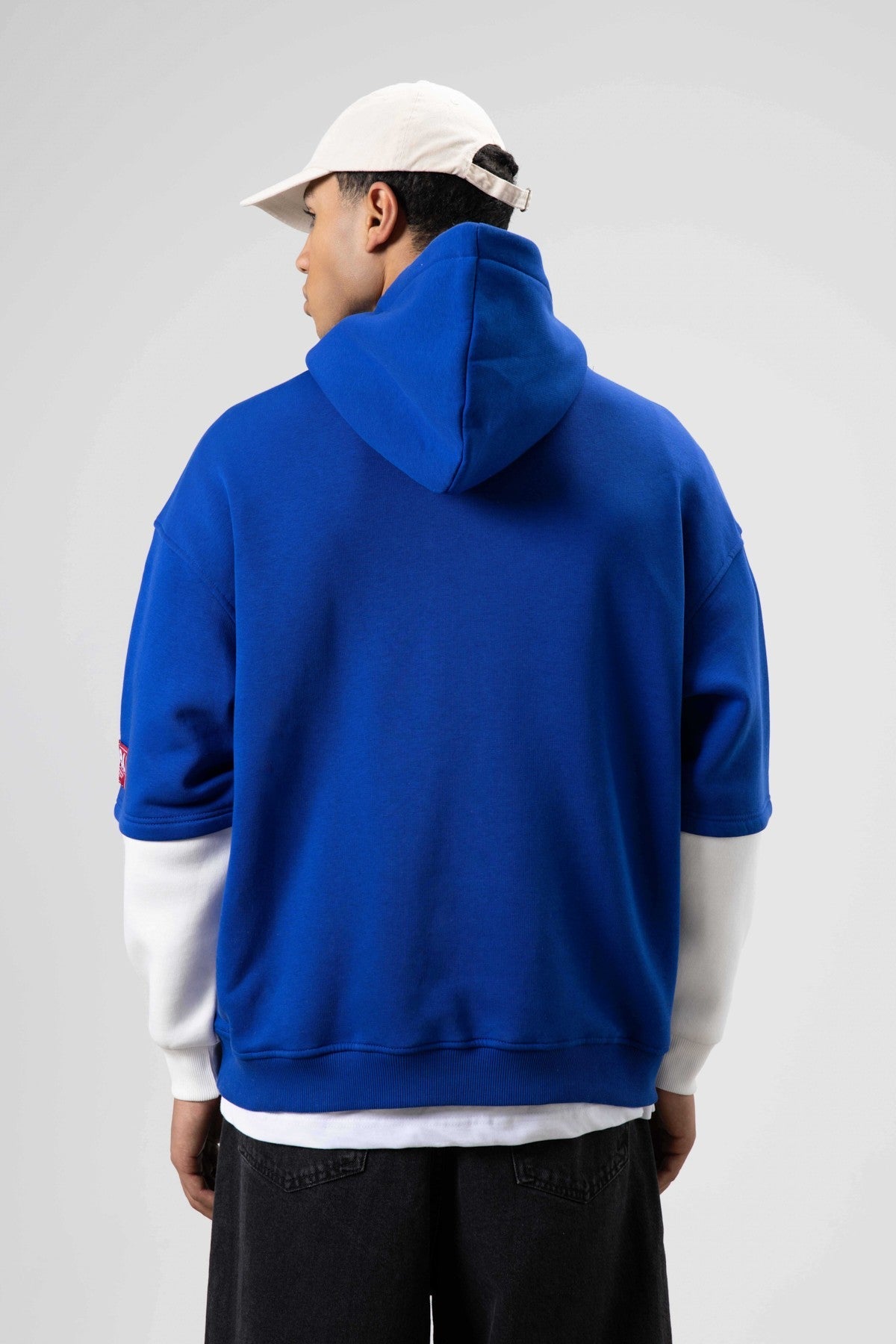Oversized Printed Hooded Sweatshirt in Saks