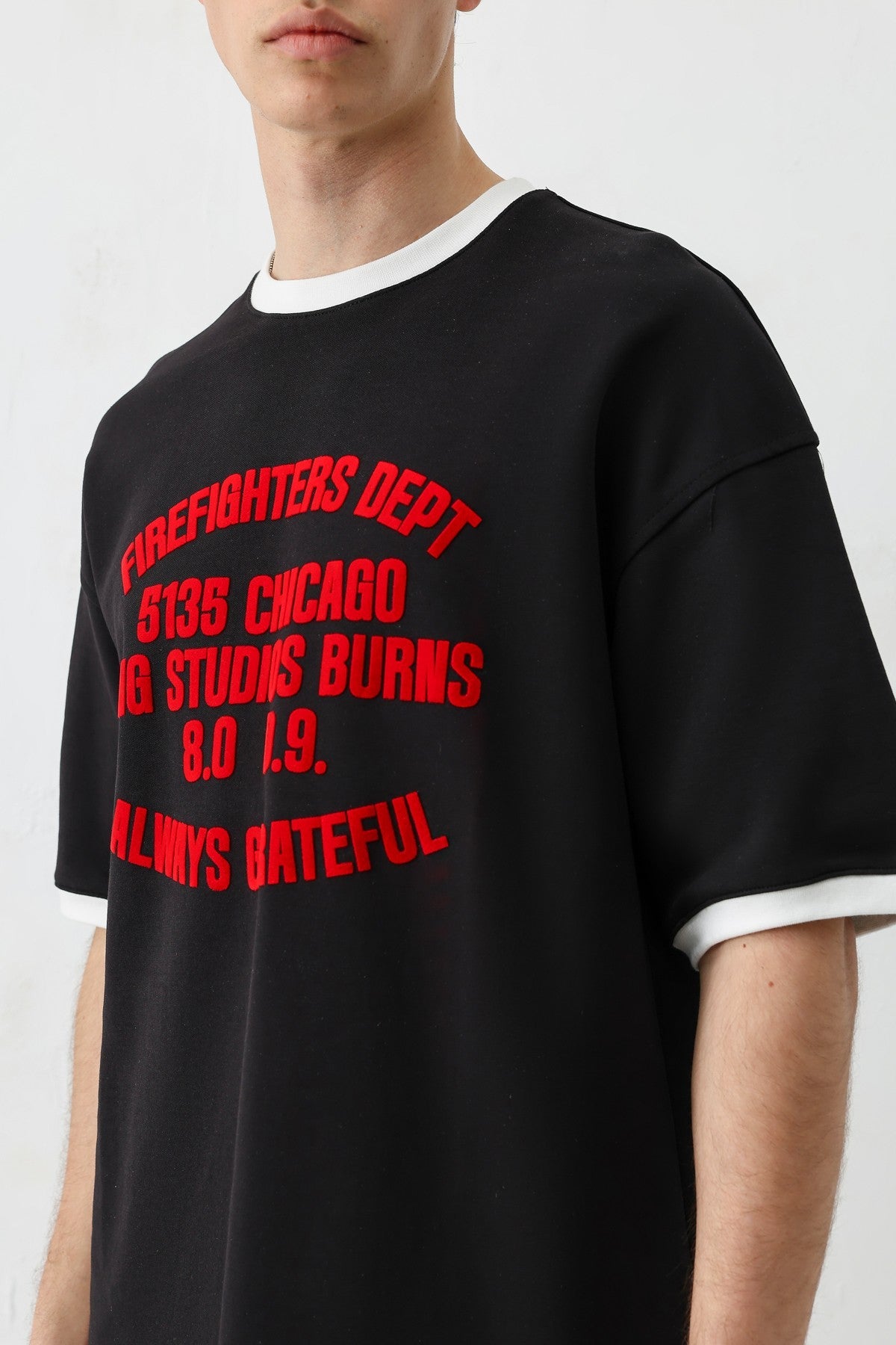 Oversized T-Shirt with a Bike Neckline and Print
