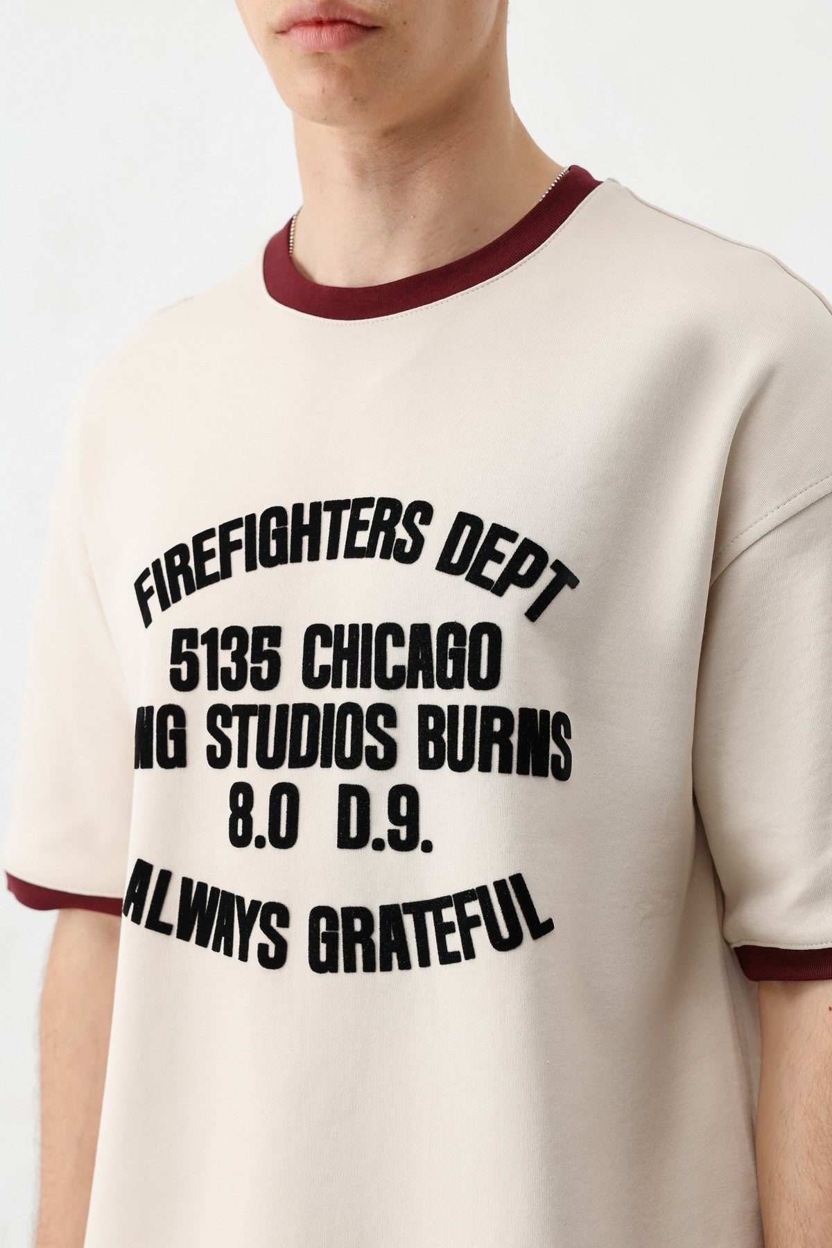 Oversized T-Shirt with a Bike Neckline and Print
